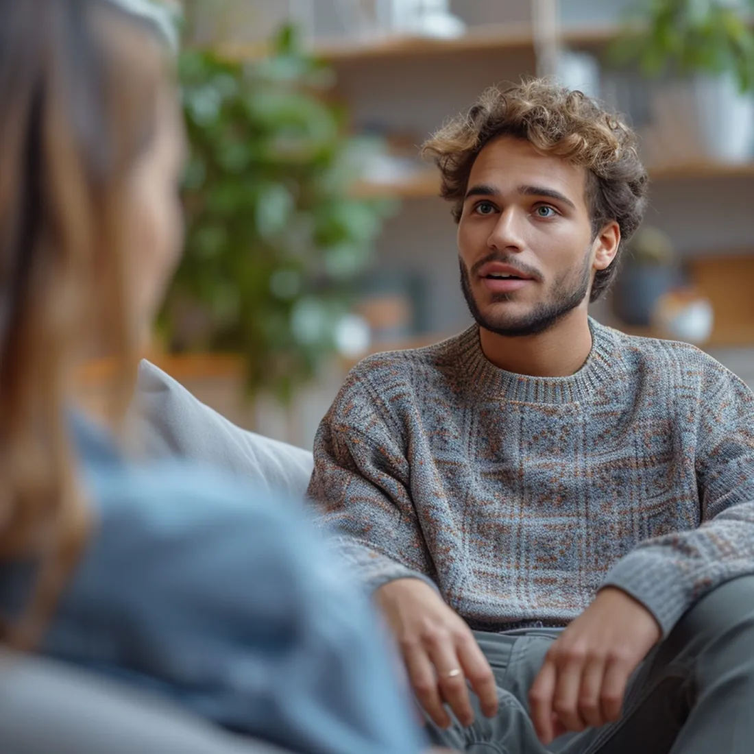 A young man listening during a session