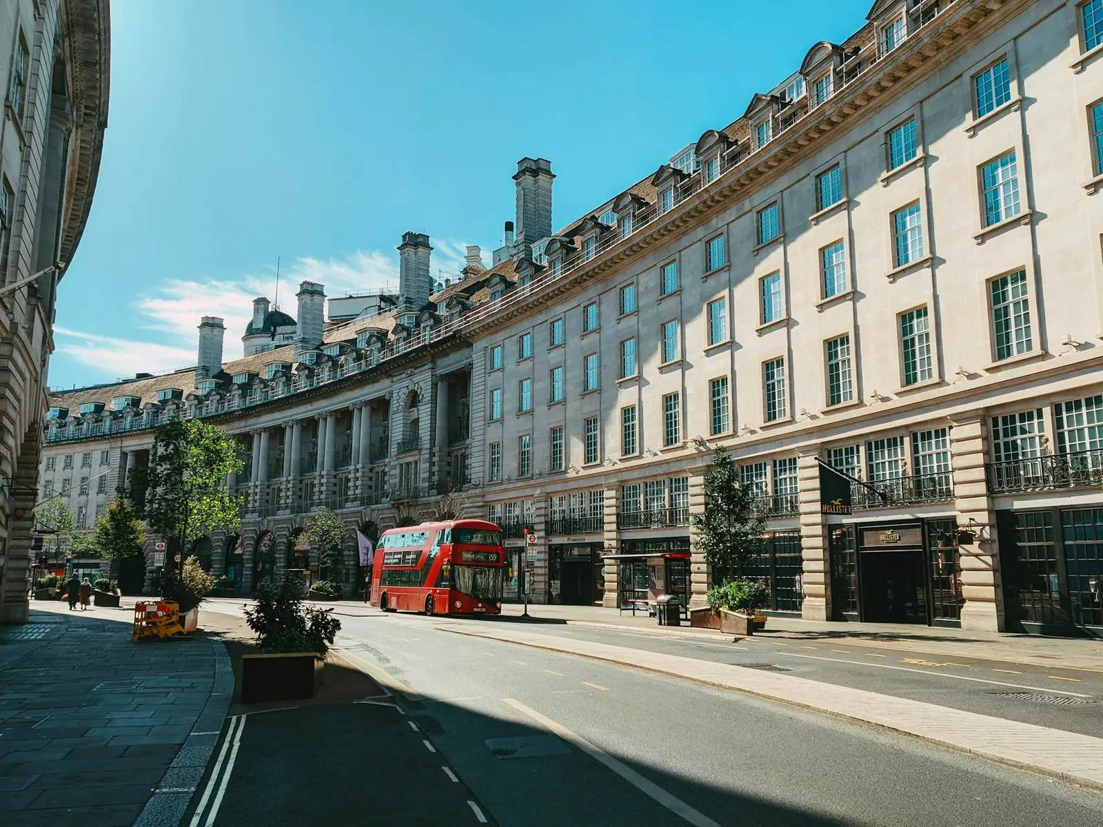 A curved street of white stone buildings in London