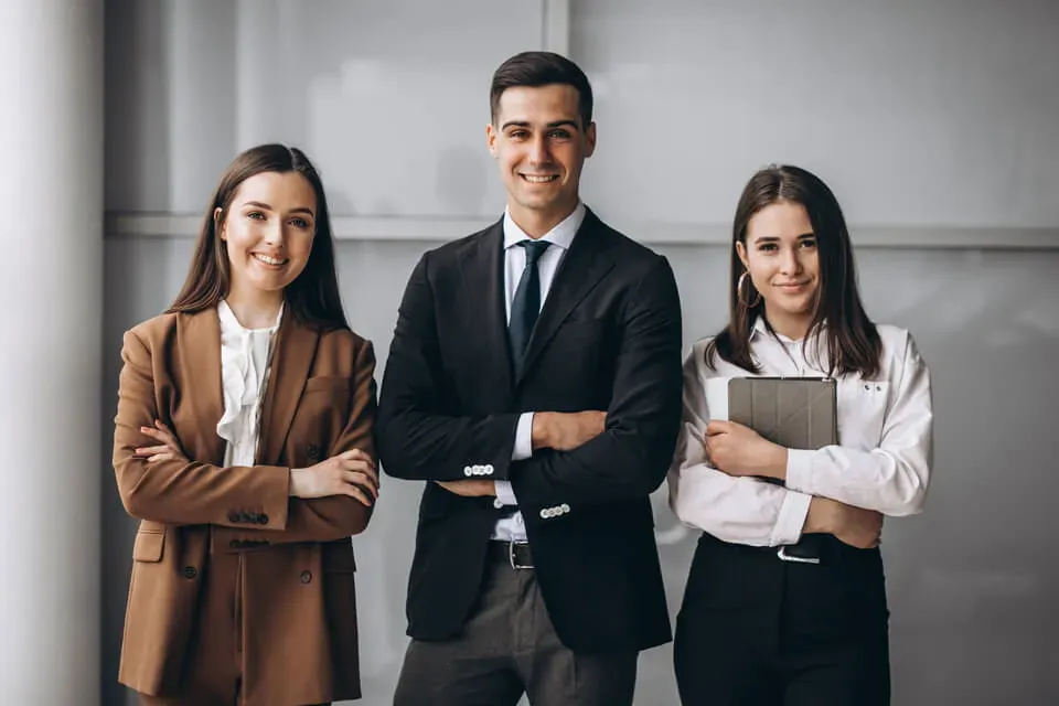 Three agents smiling