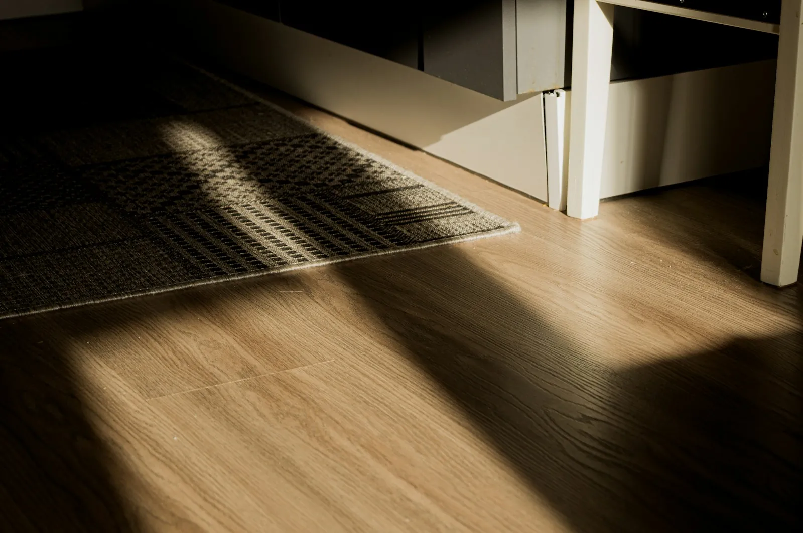 Sunlight across a new wooden floor