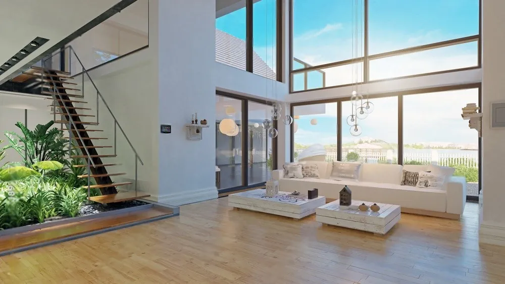 A double-height living room with tall windows