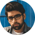 A client with glasses and a beard
