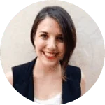 A smiling client in a dark blazer