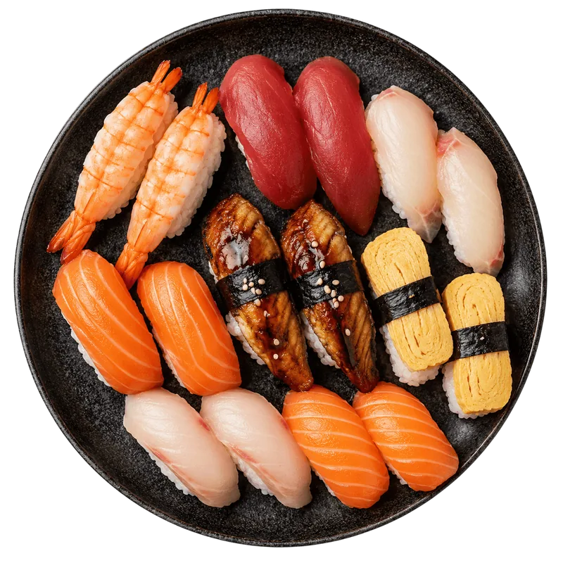 A platter of salmon, tuna, shrimp and eel nigiri