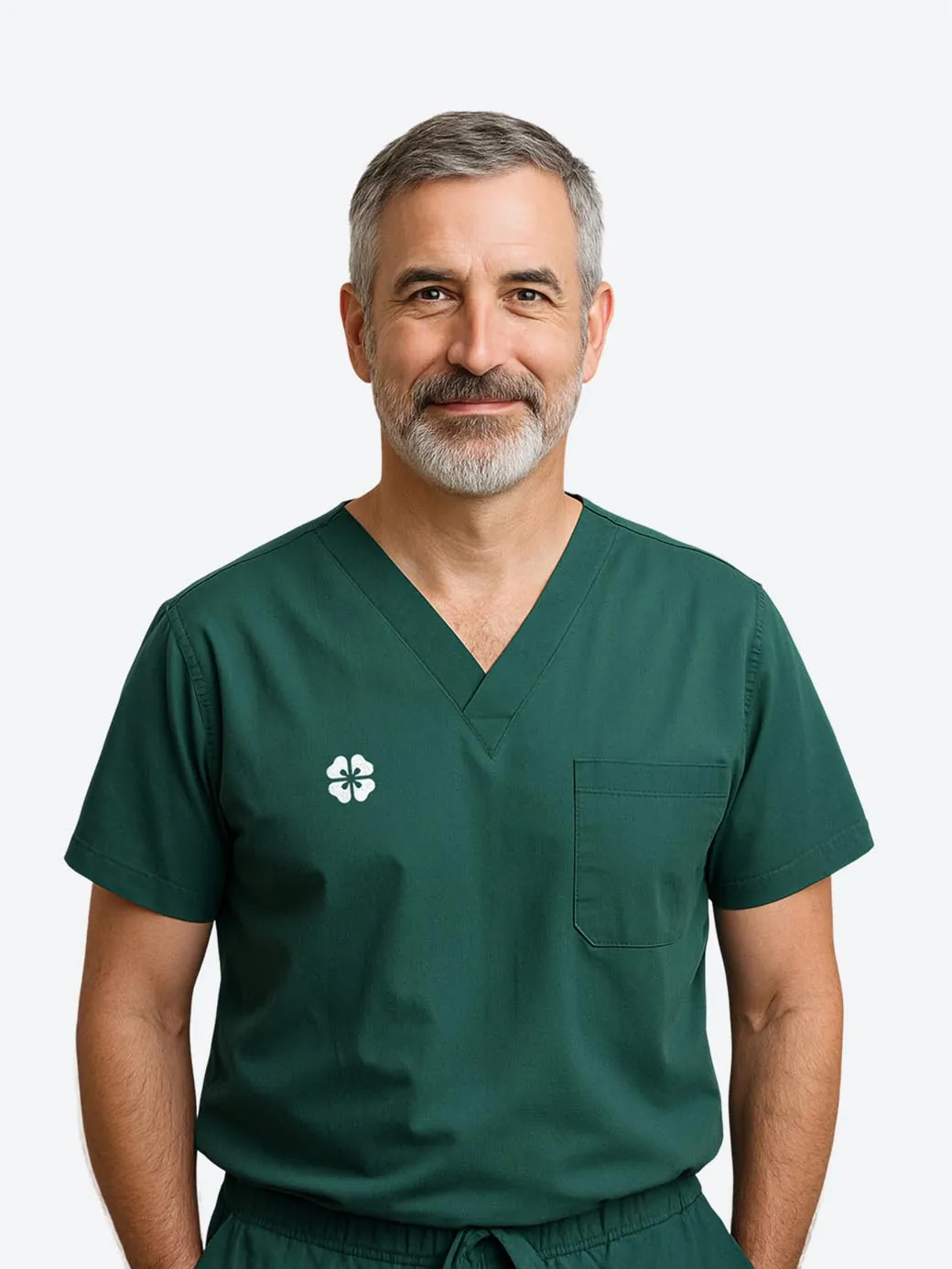 Dr. James Mitchell, a dentist with a grey beard in green scrubs