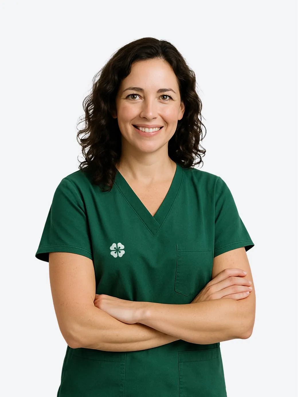 Dr. Lauren Parker, a dentist with dark curly hair in green scrubs