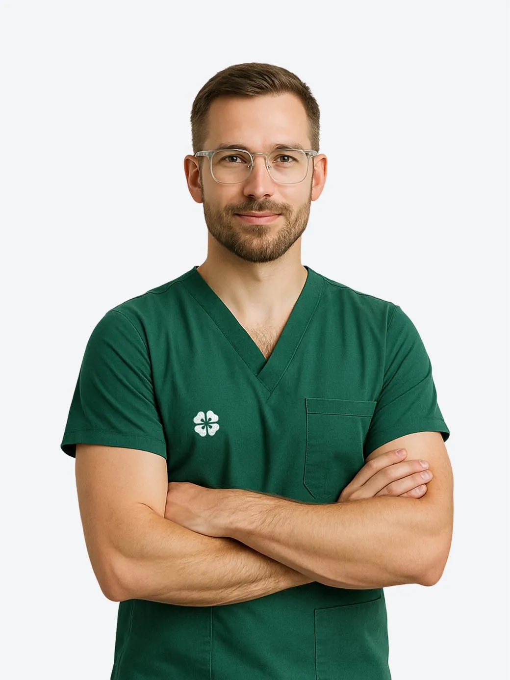 Dr. Michael Reynolds, a bearded dentist with glasses in green scrubs