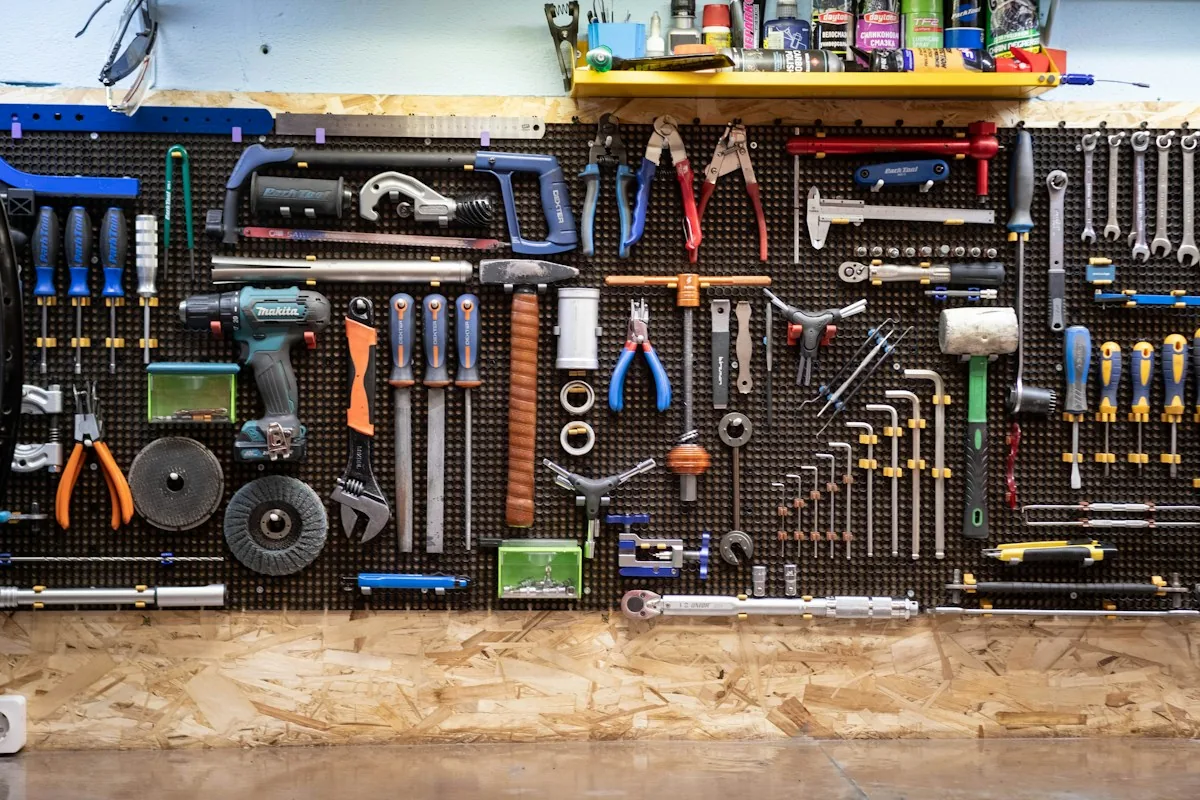 A wall of neatly hung hand tools