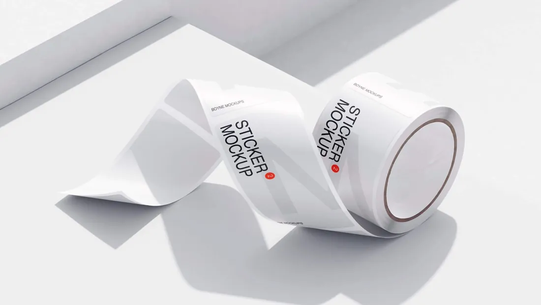 A roll of printed packing tape on white