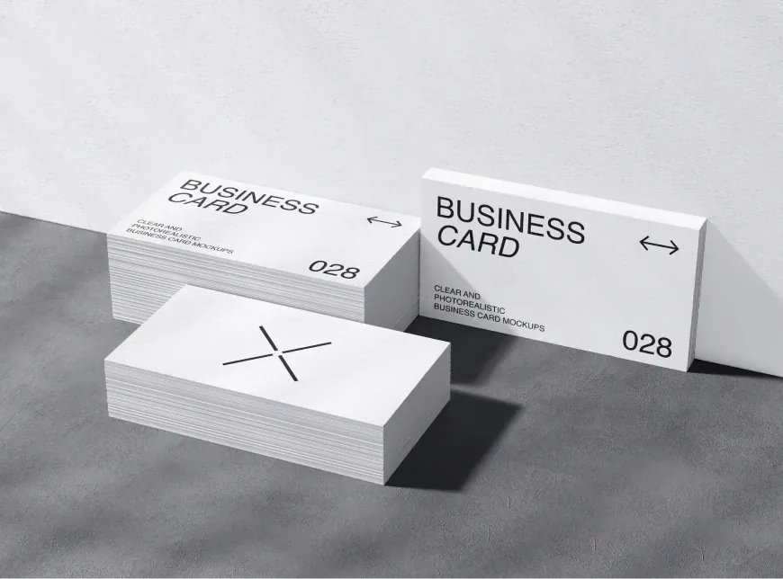 Stacks of business cards on grey felt