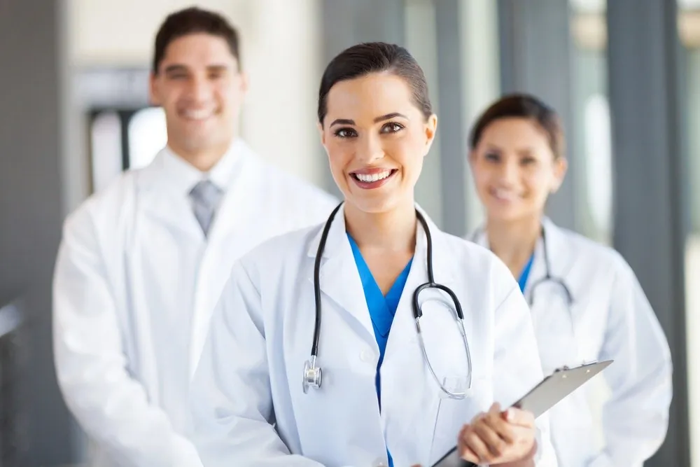 A team of smiling doctors