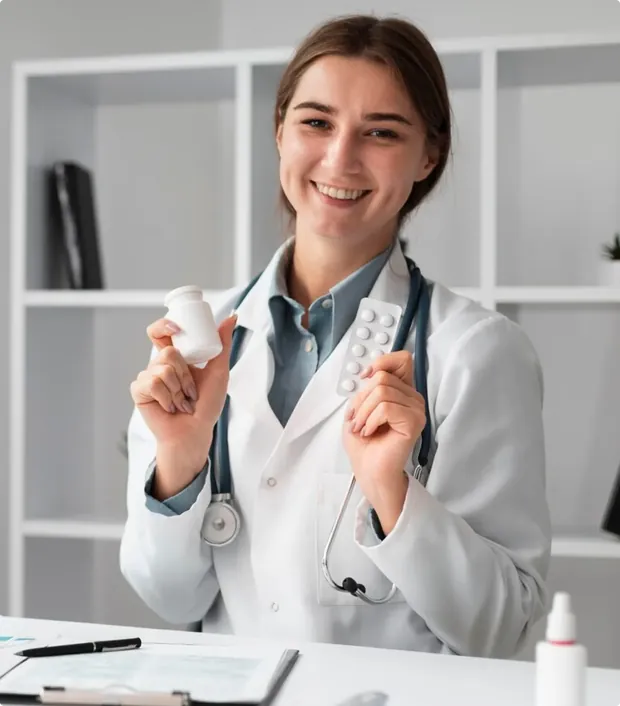 A smiling doctor holding a bottle of pills