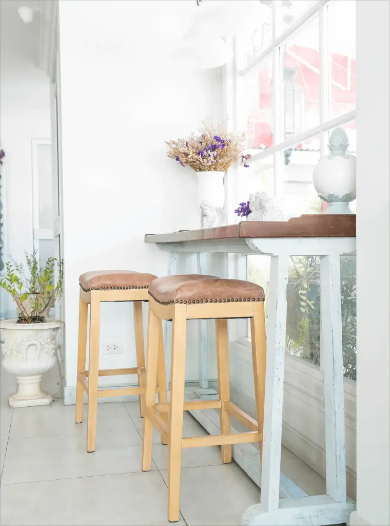 Two bar stools at a bright breakfast bar
