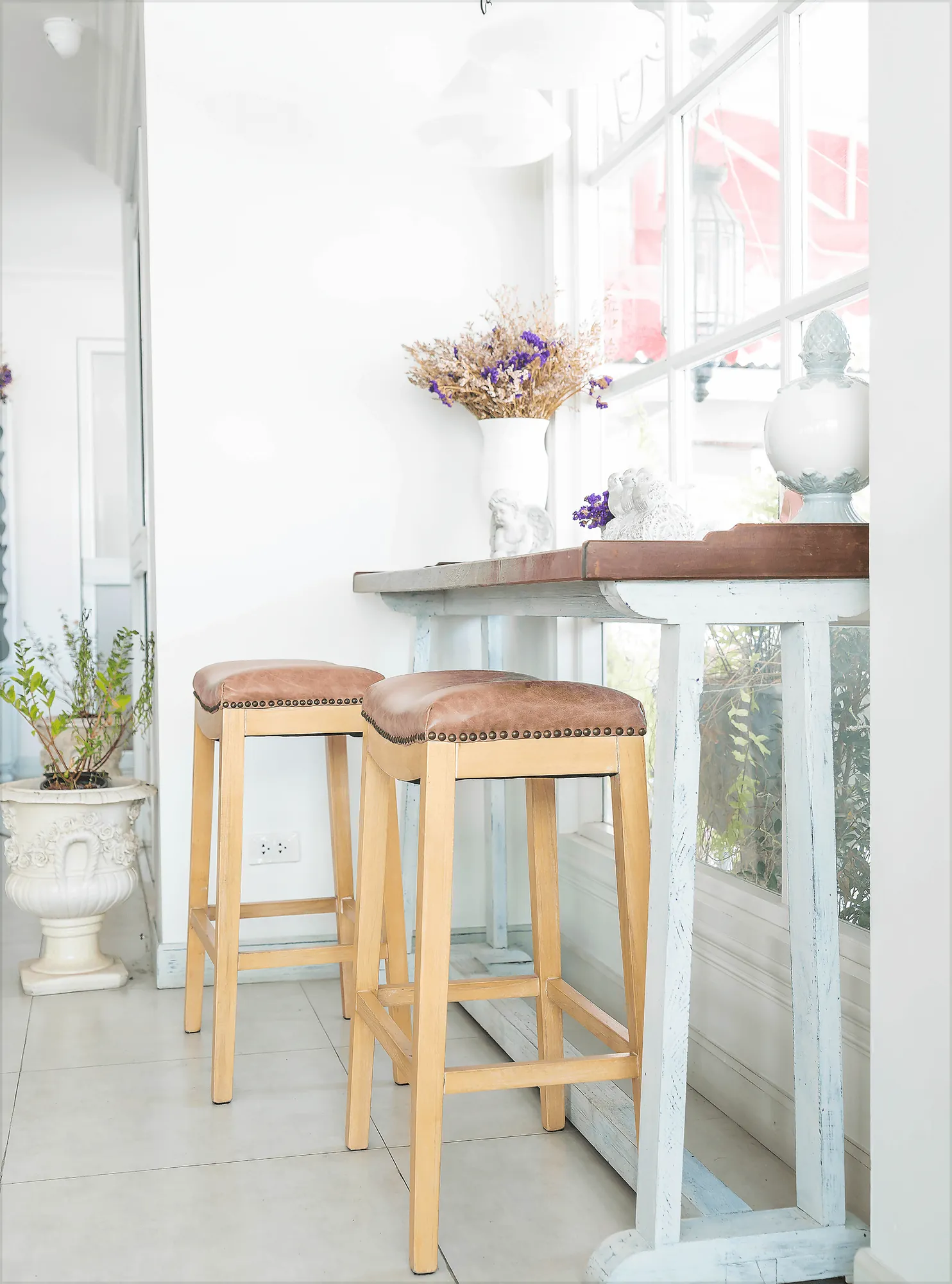 Two bar stools at a bright breakfast bar