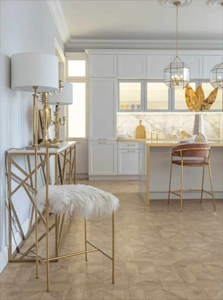 A gold console table and a fur stool in a white kitchen