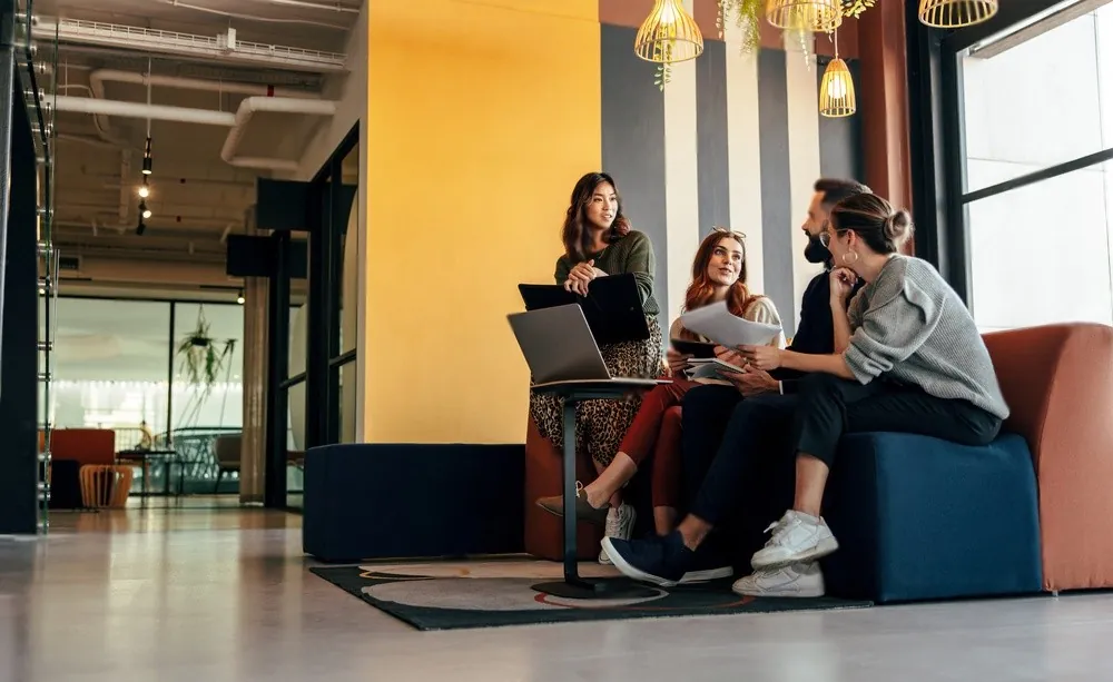 Colleagues meeting in a colourful office