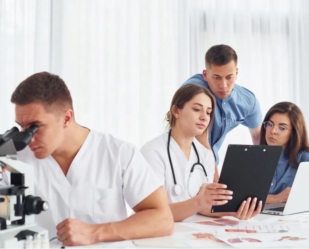 A team of doctors at work in a lab