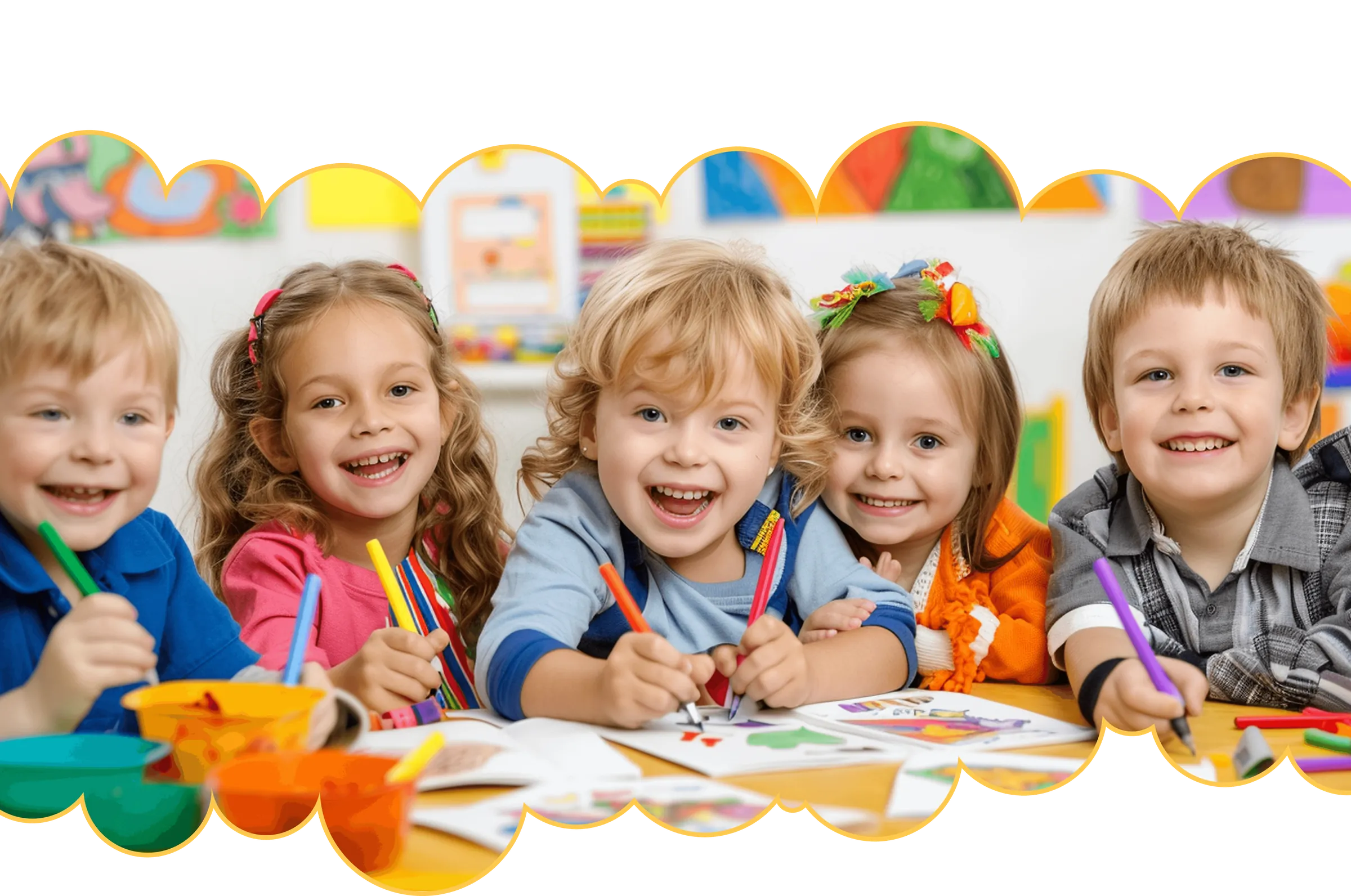 Smiling children drawing together at a table