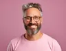 A team member with grey hair and glasses