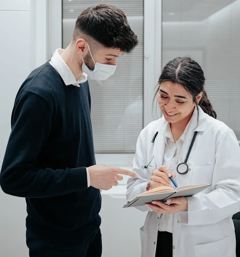 A doctor talking with a patient
