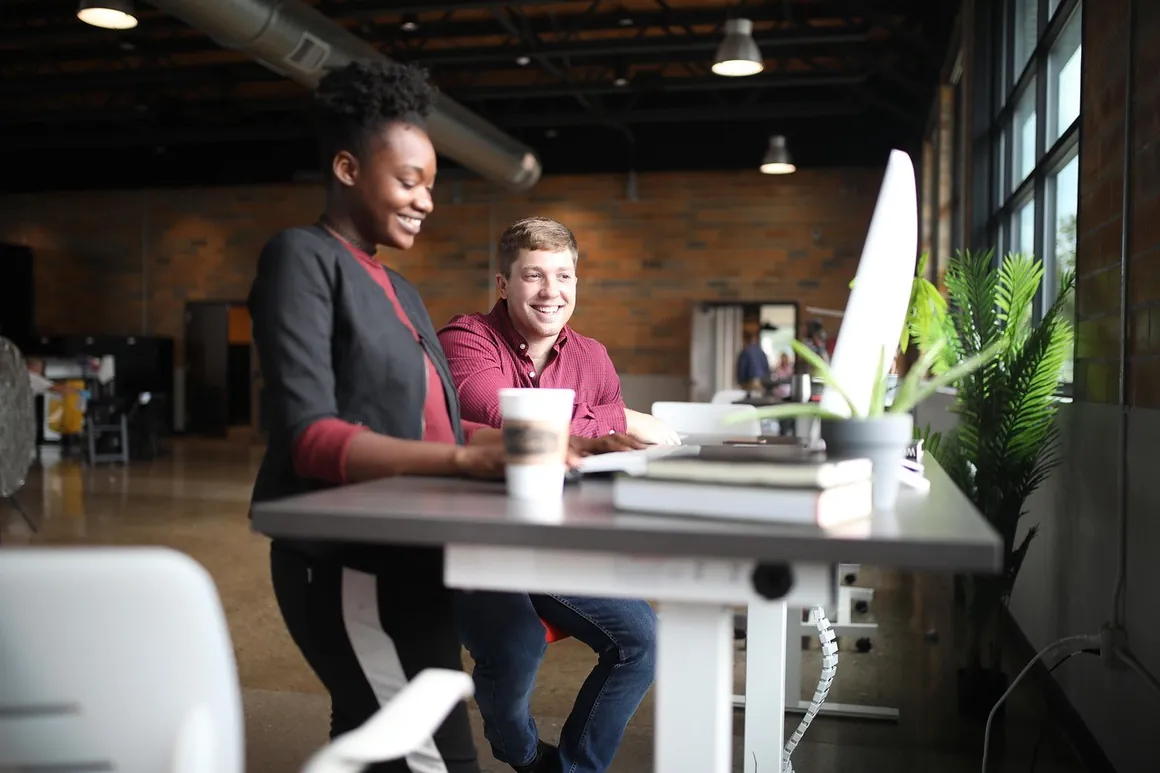 A team working at their desks in an open office
