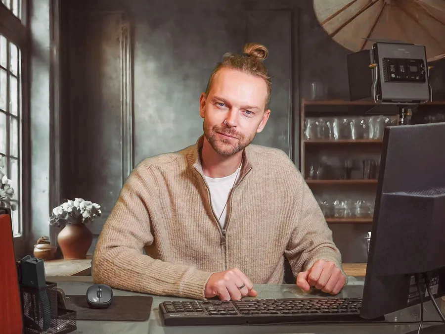A man booking a consultation on his laptop