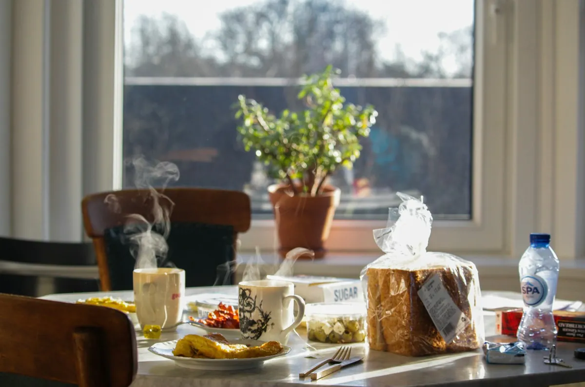A breakfast table by a window