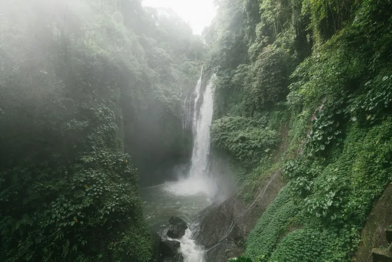 A waterfall in a green valley