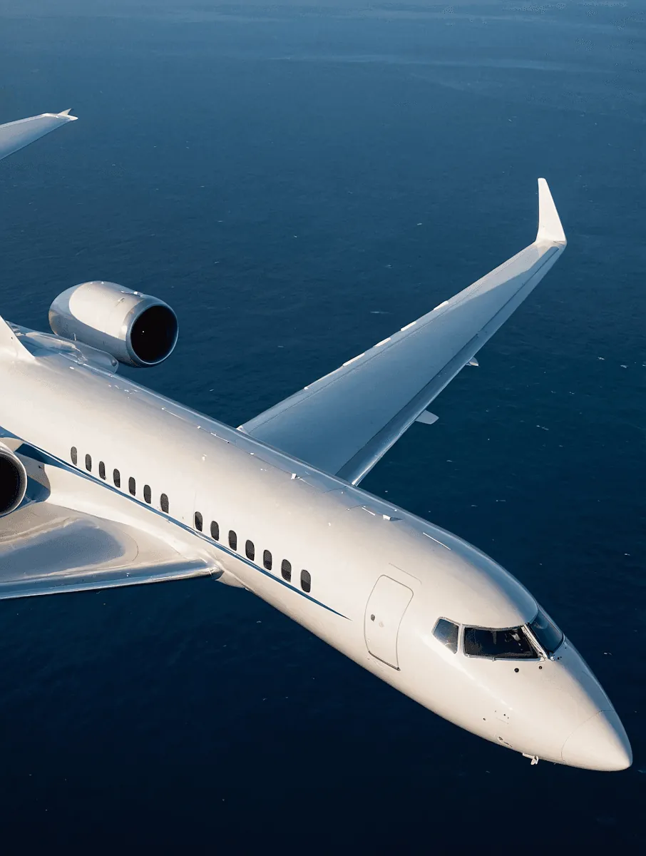 A private jet flying over the sea