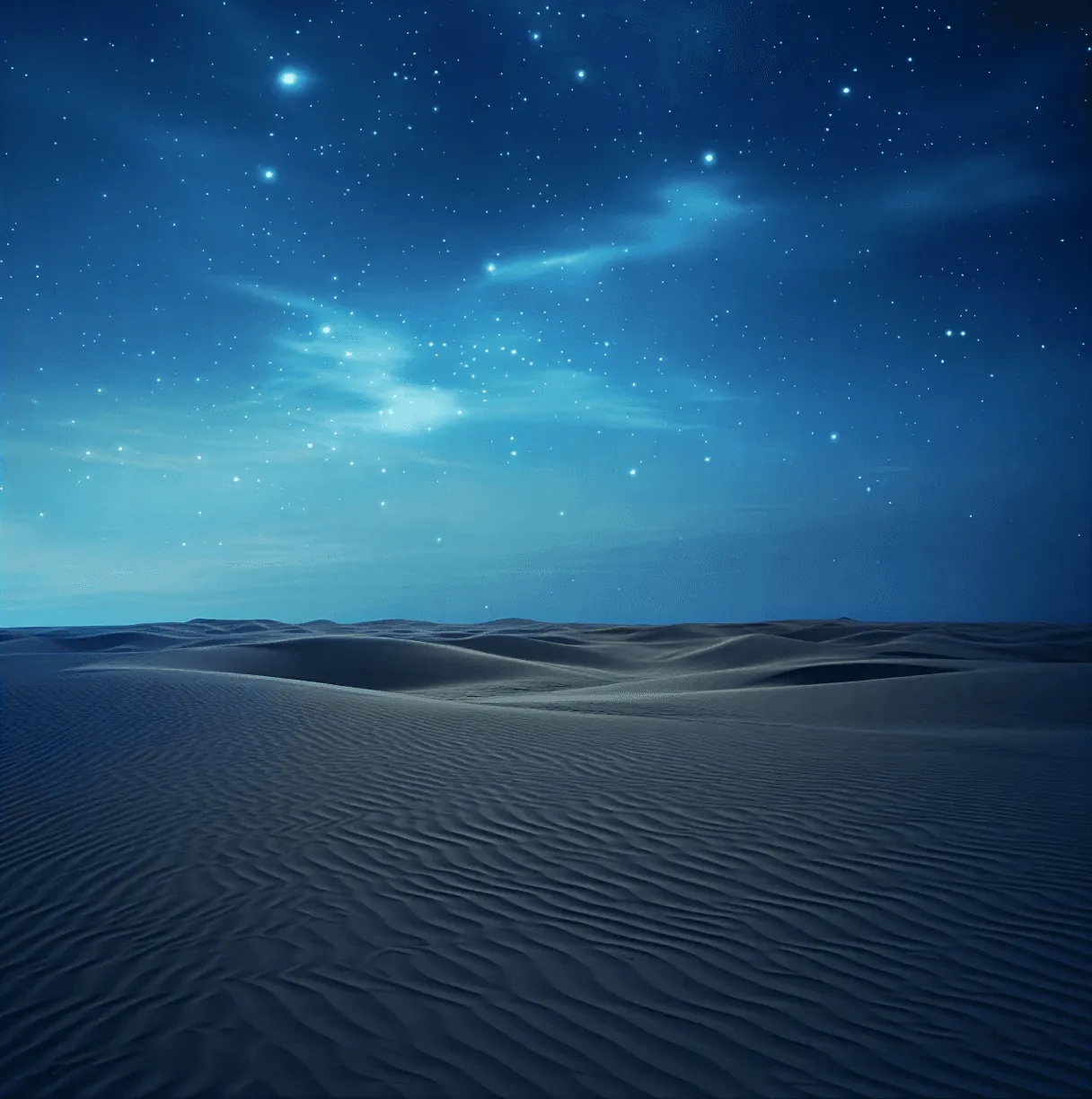 Desert dunes under a starry night sky