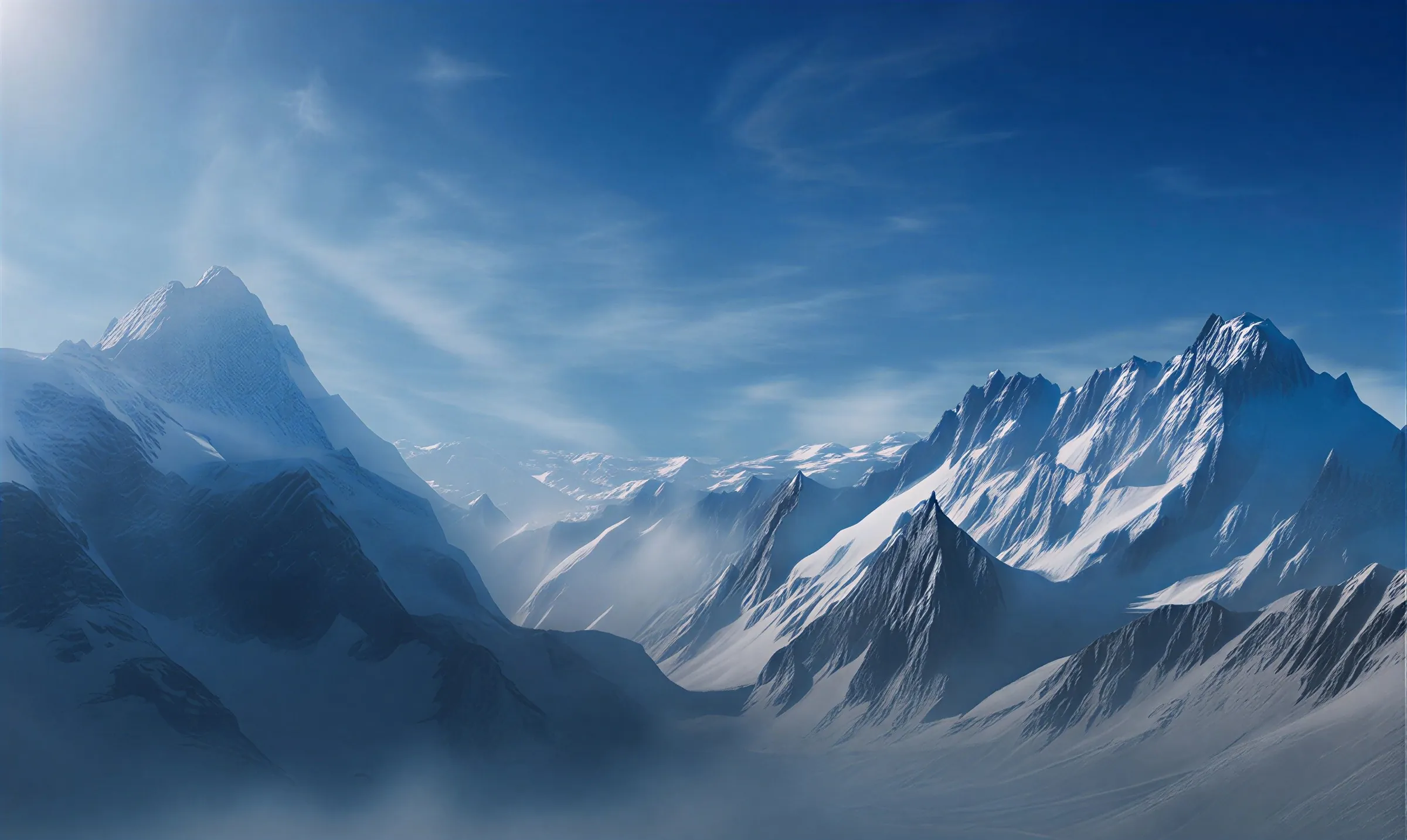 Snowy mountain ridges in blue evening light